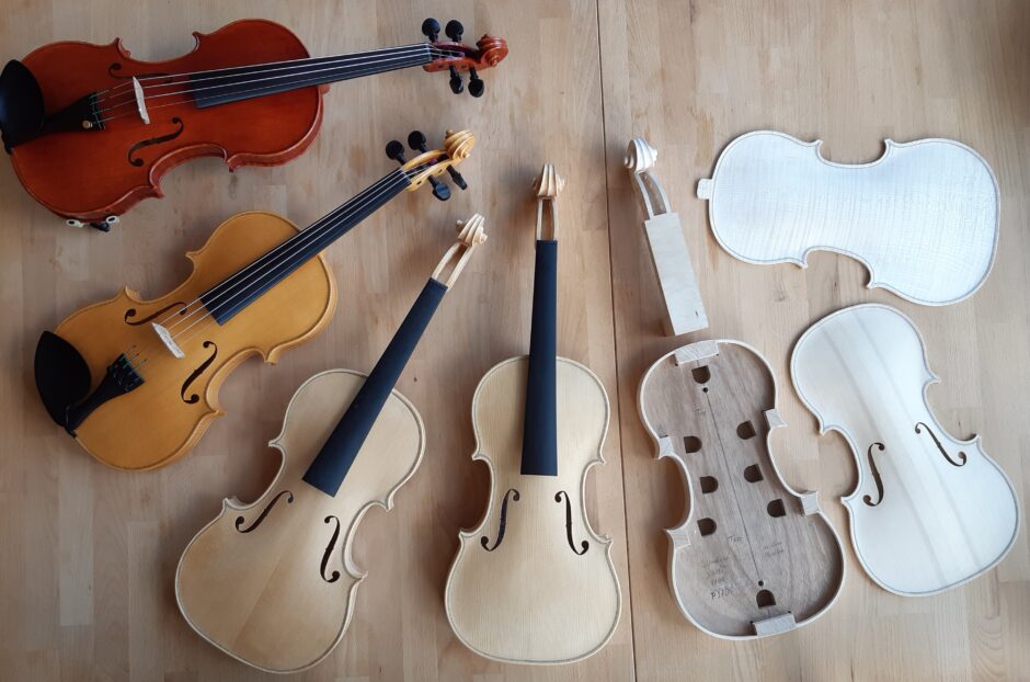Christian Müller Fiddles at various stages of completion